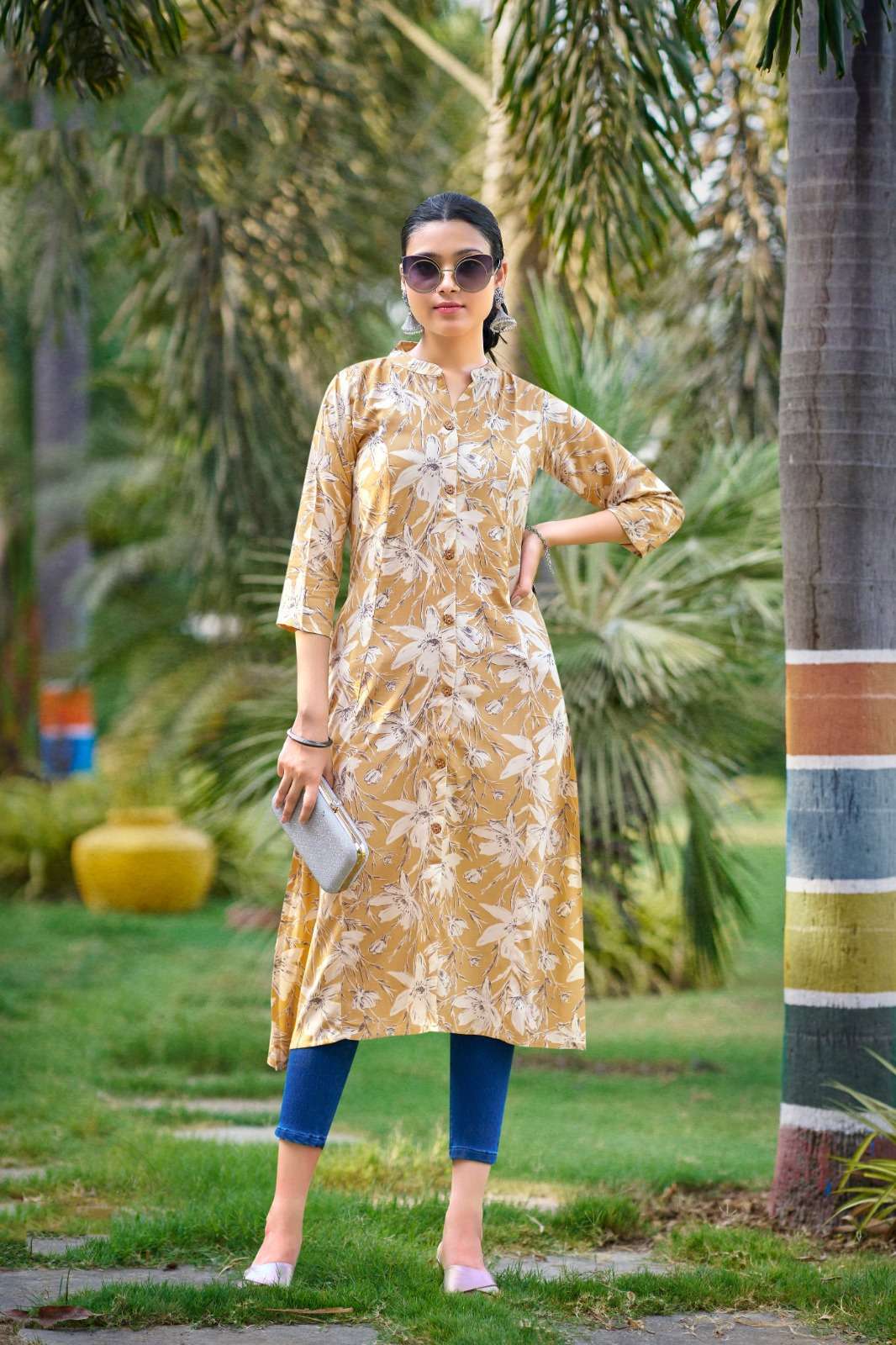 TT-1004 MI ONE PIECE RAYON A LINE PRINTED POCKET KURTI  