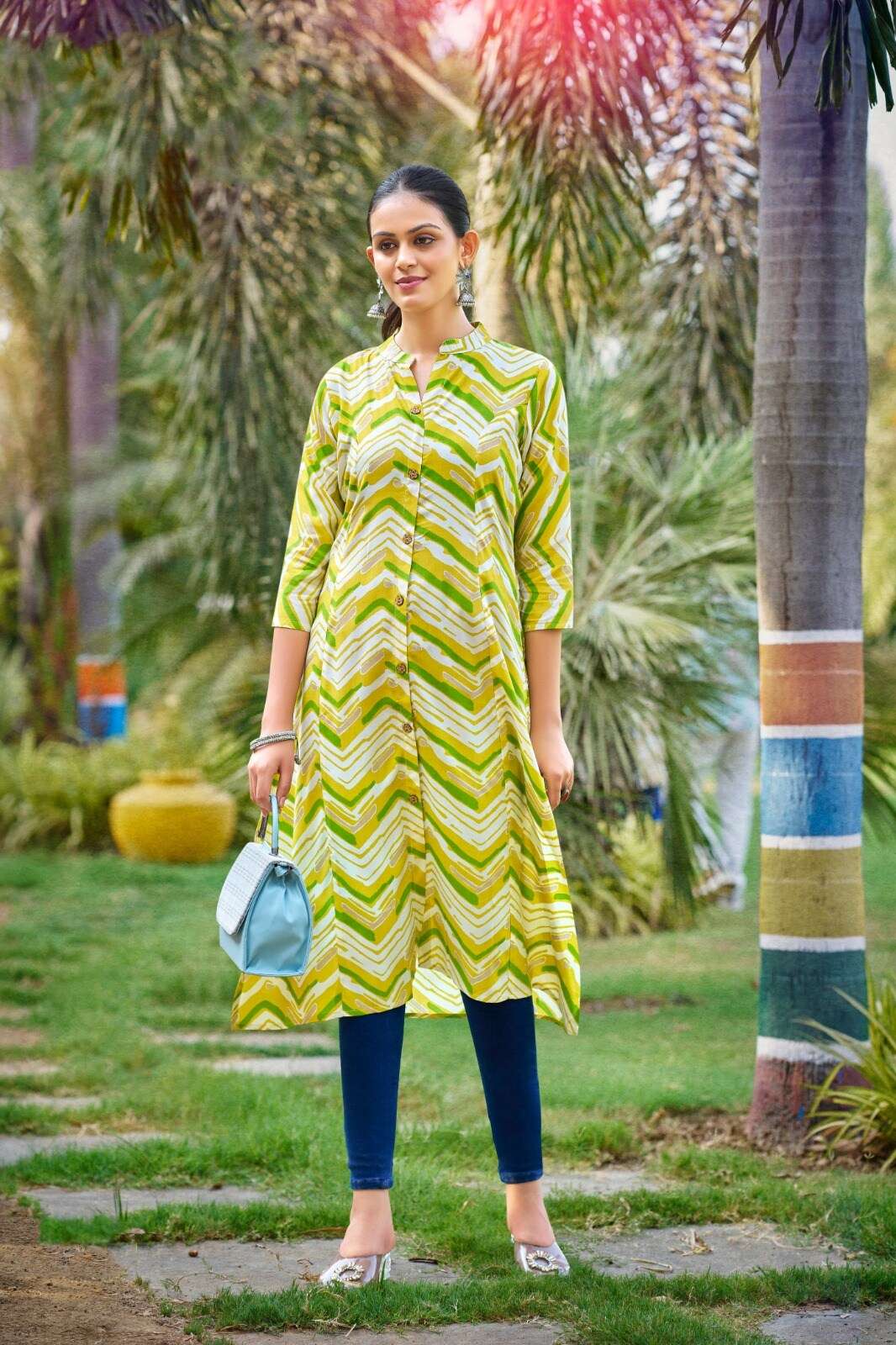 TT-1005 MI ONE PIECE RAYON A LINE PRINTED POCKET KURTI   