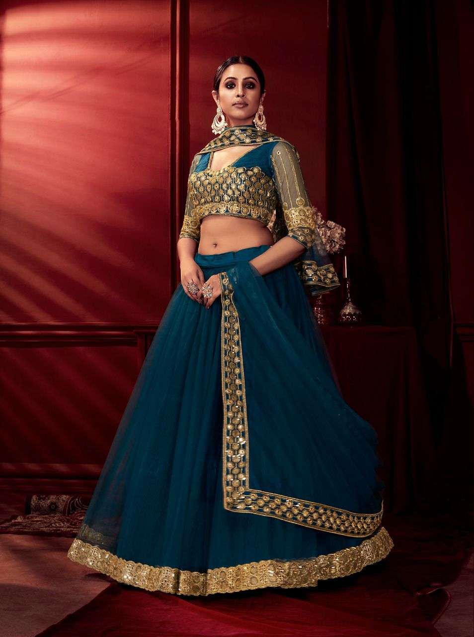 SHREE MATEE DESIGNER PARTY WEAR SUNEHRI LEHENGHA WHOLESALE SUPPLIER FROM SURAT 