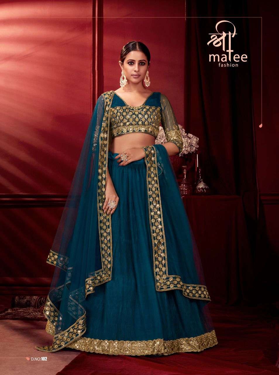 SHREE MATEE DESIGNER PARTY WEAR SUNEHRI LEHENGHA WHOLESALE SUPPLIER FROM SURAT 
