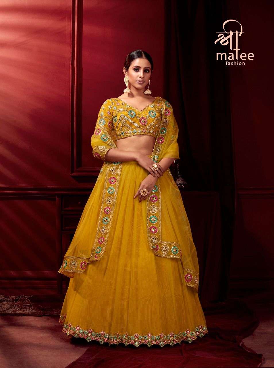 SHREE MATEE DESIGNER PARTY WEAR SUNEHRI LEHENGHA WHOLESALE SUPPLIER FROM SURAT 
