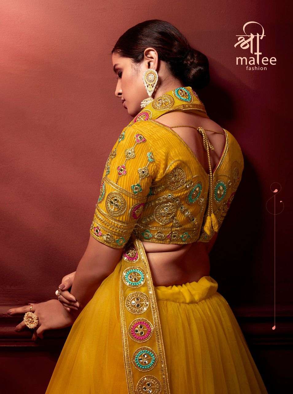 SHREE MATEE DESIGNER PARTY WEAR SUNEHRI LEHENGHA WHOLESALE SUPPLIER FROM SURAT 