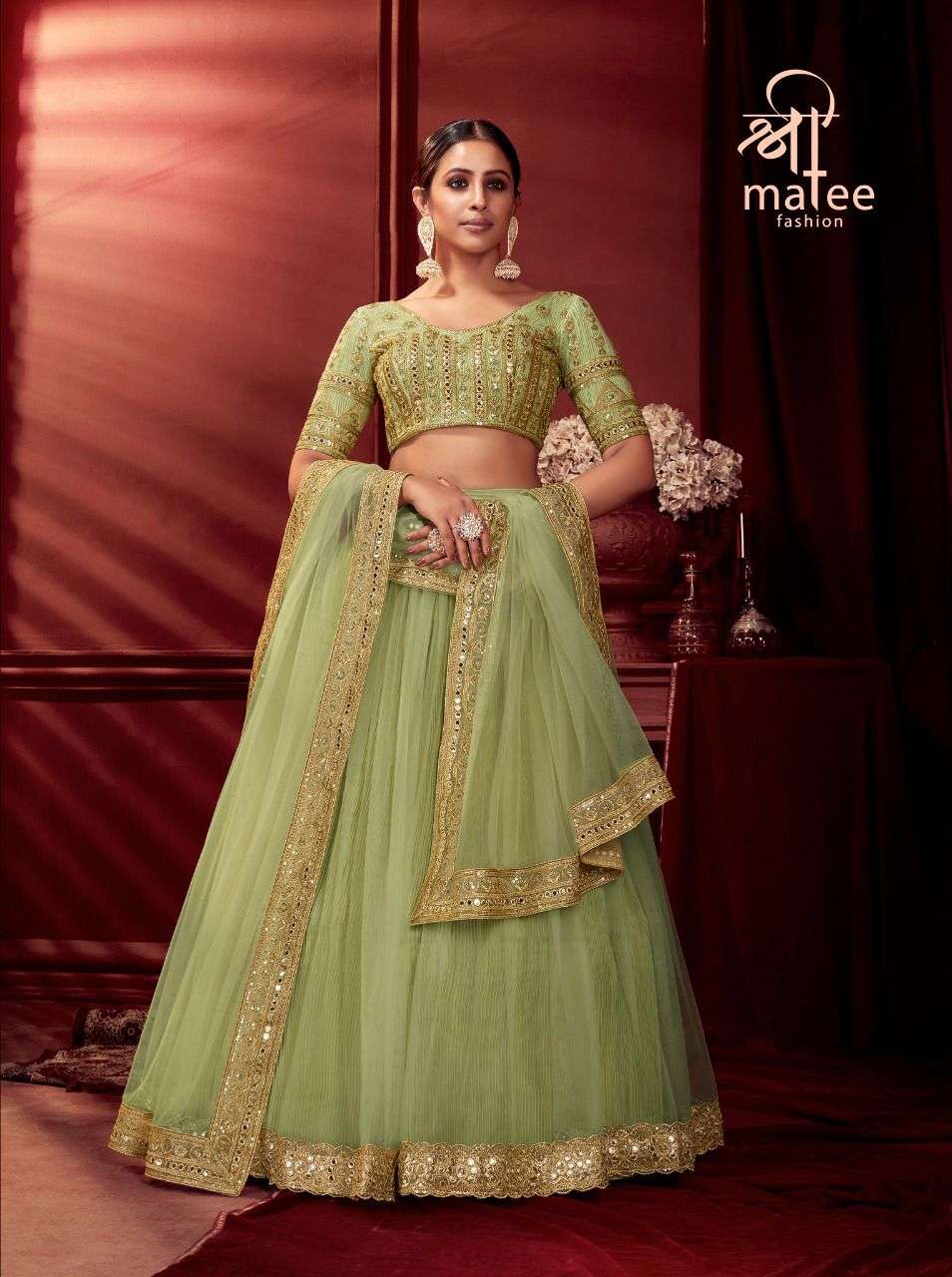 SHREE MATEE DESIGNER PARTY WEAR SUNEHRI LEHENGHA WHOLESALE SUPPLIER FROM SURAT 