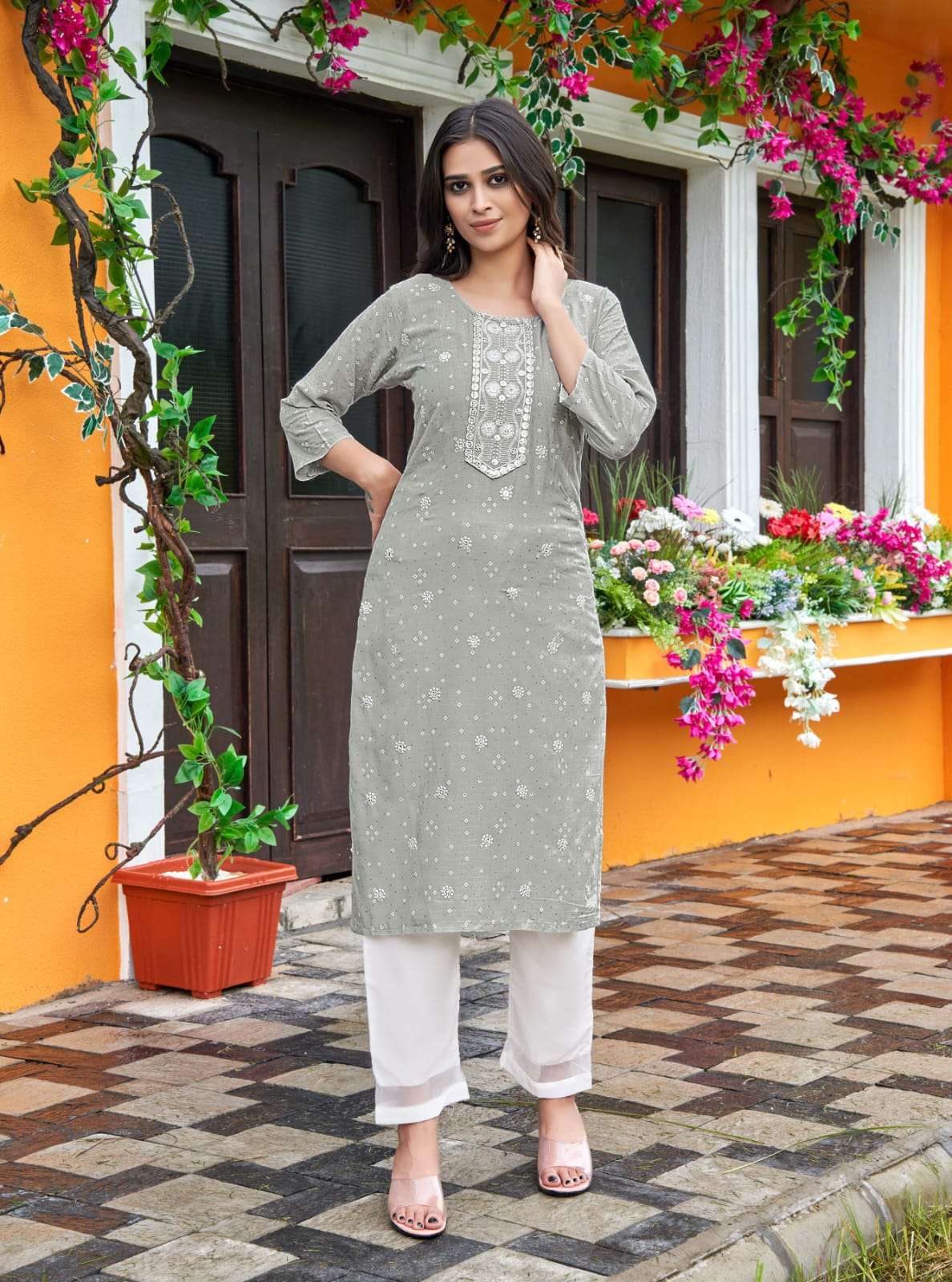We women ethnic a brand of kurtis by adventure pure reyon straight kurti  catalog at wholesale rate