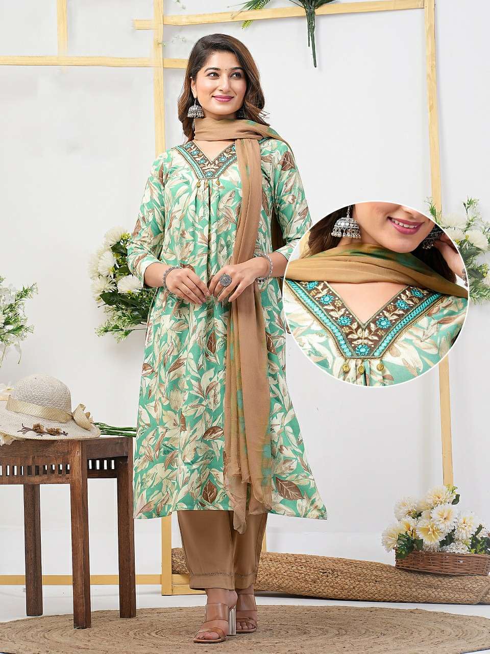 LIGHT TEAL BLUE COLOUR PRINTED RAYON STRAIGHT CUT KURTI 