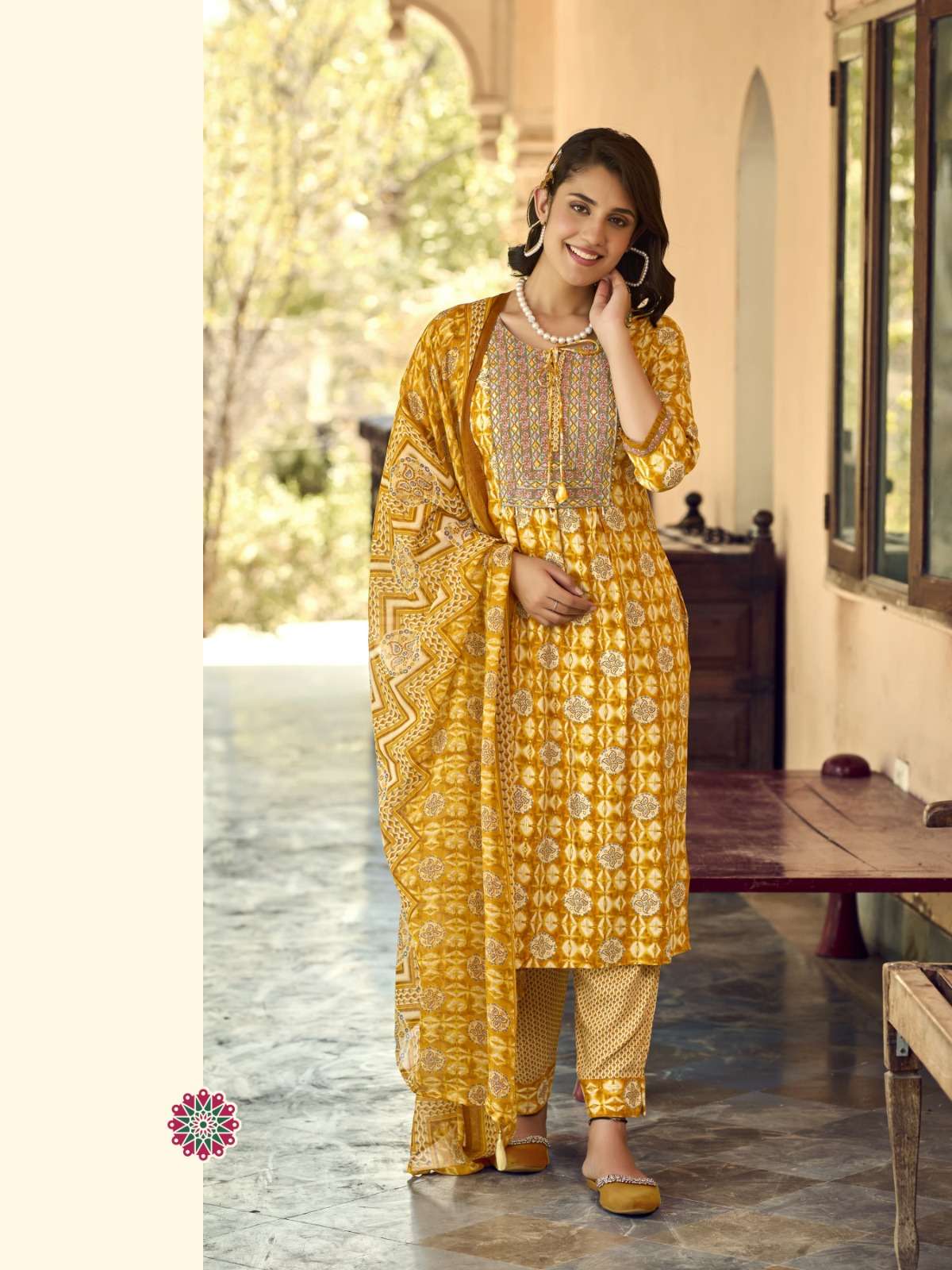 YELLOW COLOUR PRINTED RAYON KURTI 
