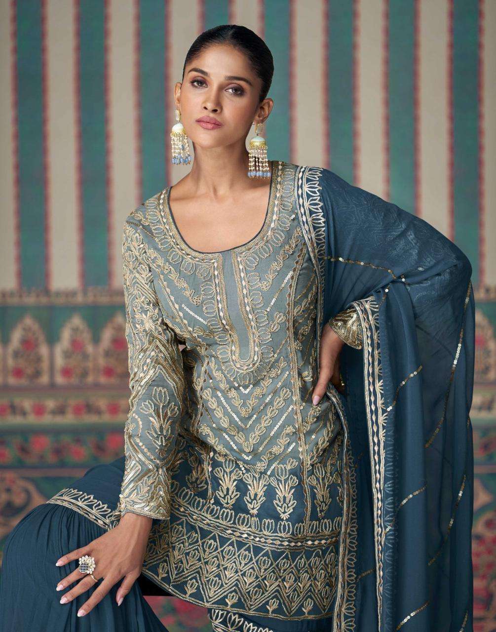 NIKHAAR BY SAYURI DESIGNER IN PREMIUM REAL GEROGETTE HEAVY EMBROIDERED TOP WITH SHARARA 