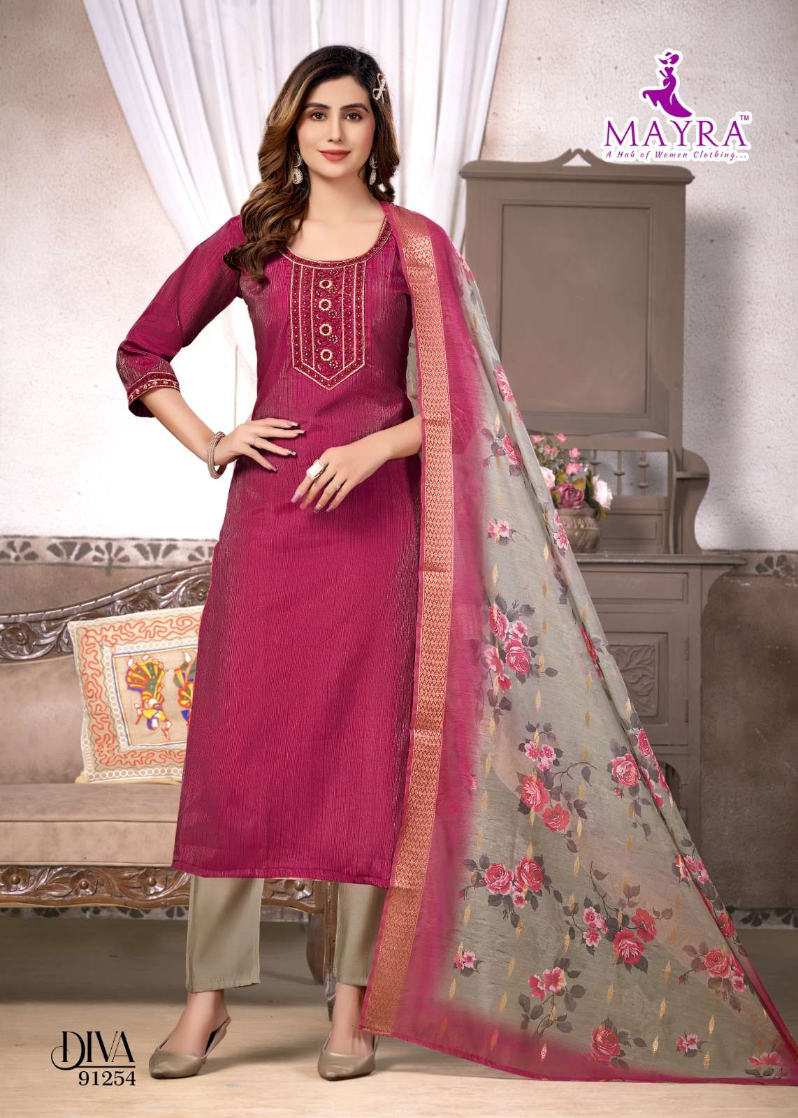 DIVA BY MAYRA FASHION IN VERTICAN SIMMER WITH SEQUENCE EMBROIDERY TIE AND BUTTI WORK