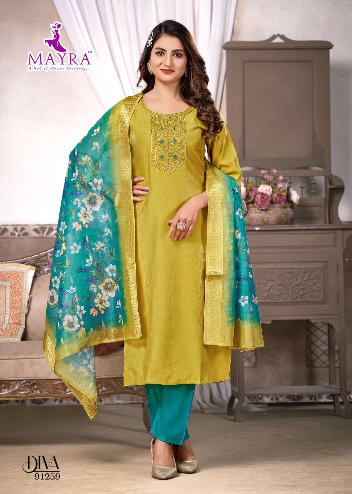 DIVA BY MAYRA FASHION IN VERTICAN SIMMER WITH SEQUENCE EMBROIDERY TIE AND BUTTI WORK