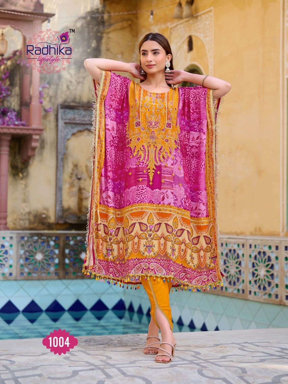 NOOR VOL:-1 BY RADHIKA LIFE STYLE IN PURE NATURAL CREP WITH HAND WORK TRENDY KAFTAAN WITH TULIP