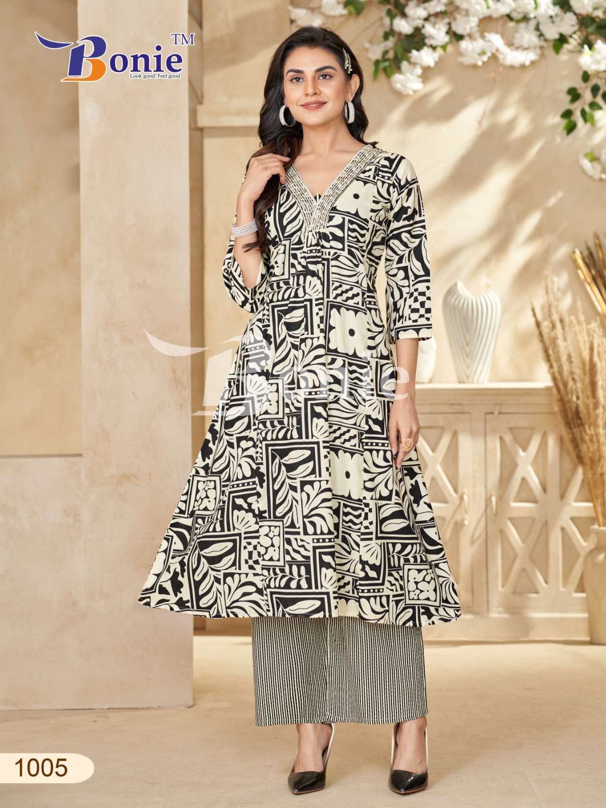 RUTVI VOL 1 BY BONIE BRAND IN LIVA PRINTS KURTI PLAZZO WITH EMBROIDERY WORK IN TOP