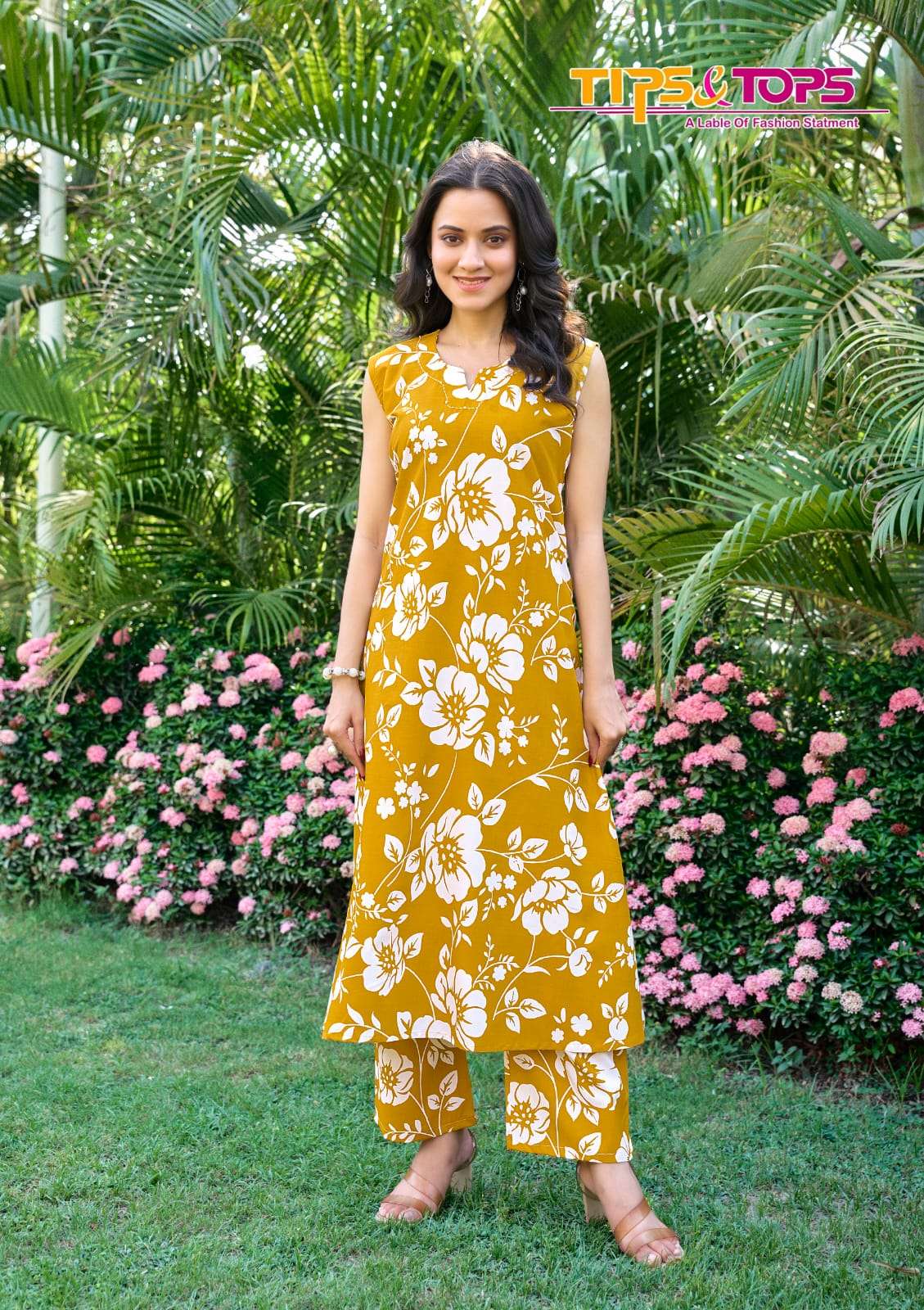 OLIVIA VOL-2 BY TIPS & TOPS IN RAYON PRINT WITH MANUAL WORK WITH POCKET 