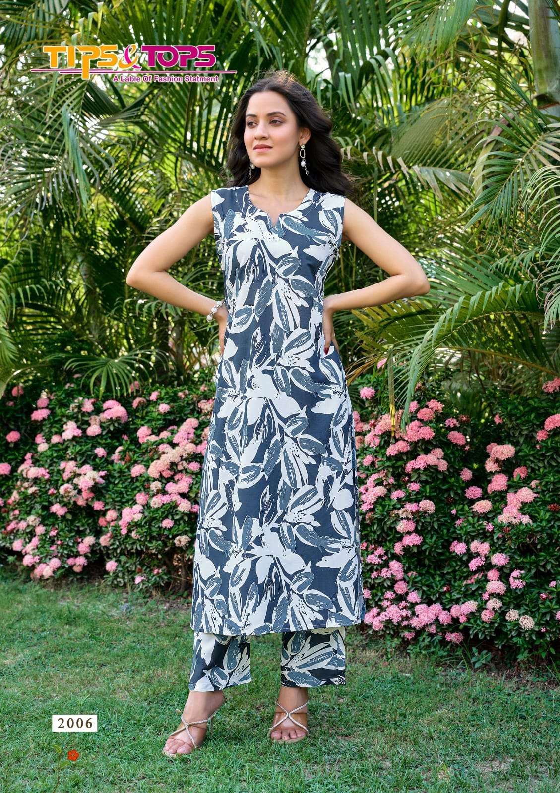 OLIVIA VOL-2 BY TIPS & TOPS IN RAYON PRINT WITH MANUAL WORK WITH POCKET 