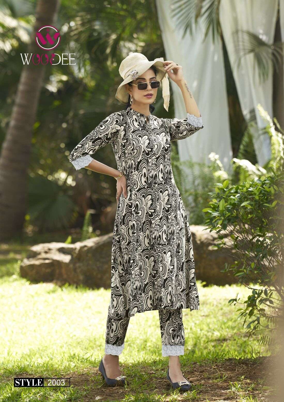 SHAKIRA VOL-2 BY WOODEE IN PREMIUM HEAVY RAYON PRINT WITH LACE AND SIDE POCKETS