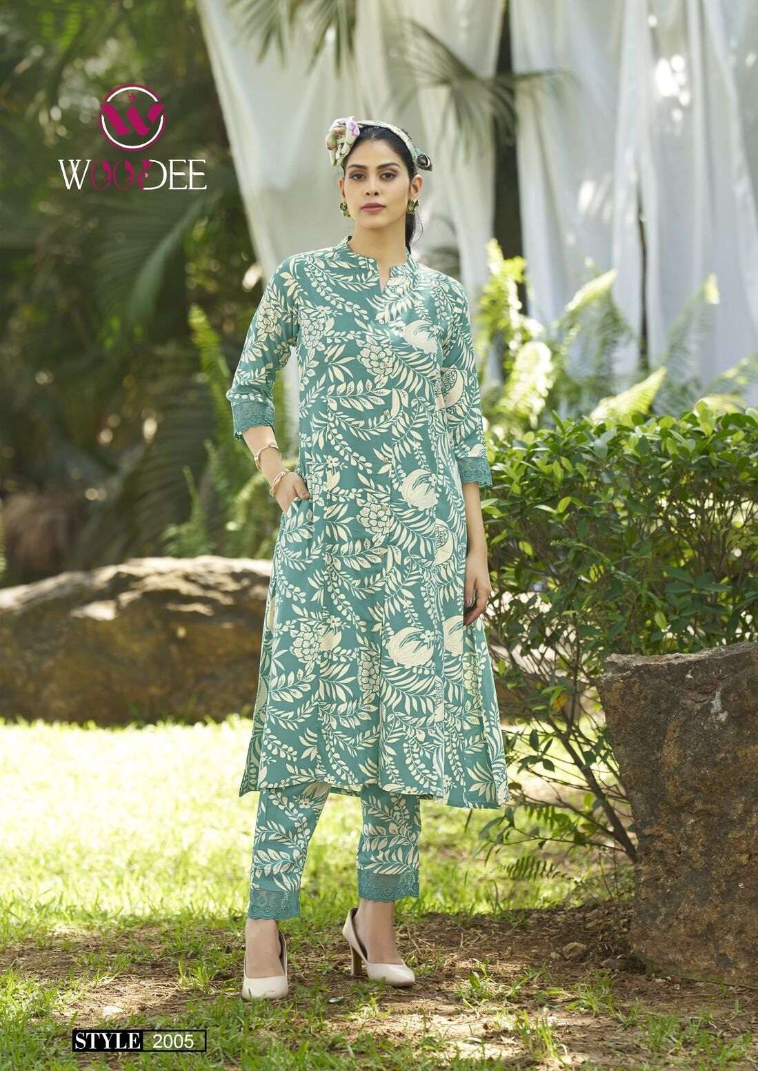 SHAKIRA VOL-2 BY WOODEE IN PREMIUM HEAVY RAYON PRINT WITH LACE AND SIDE POCKETS