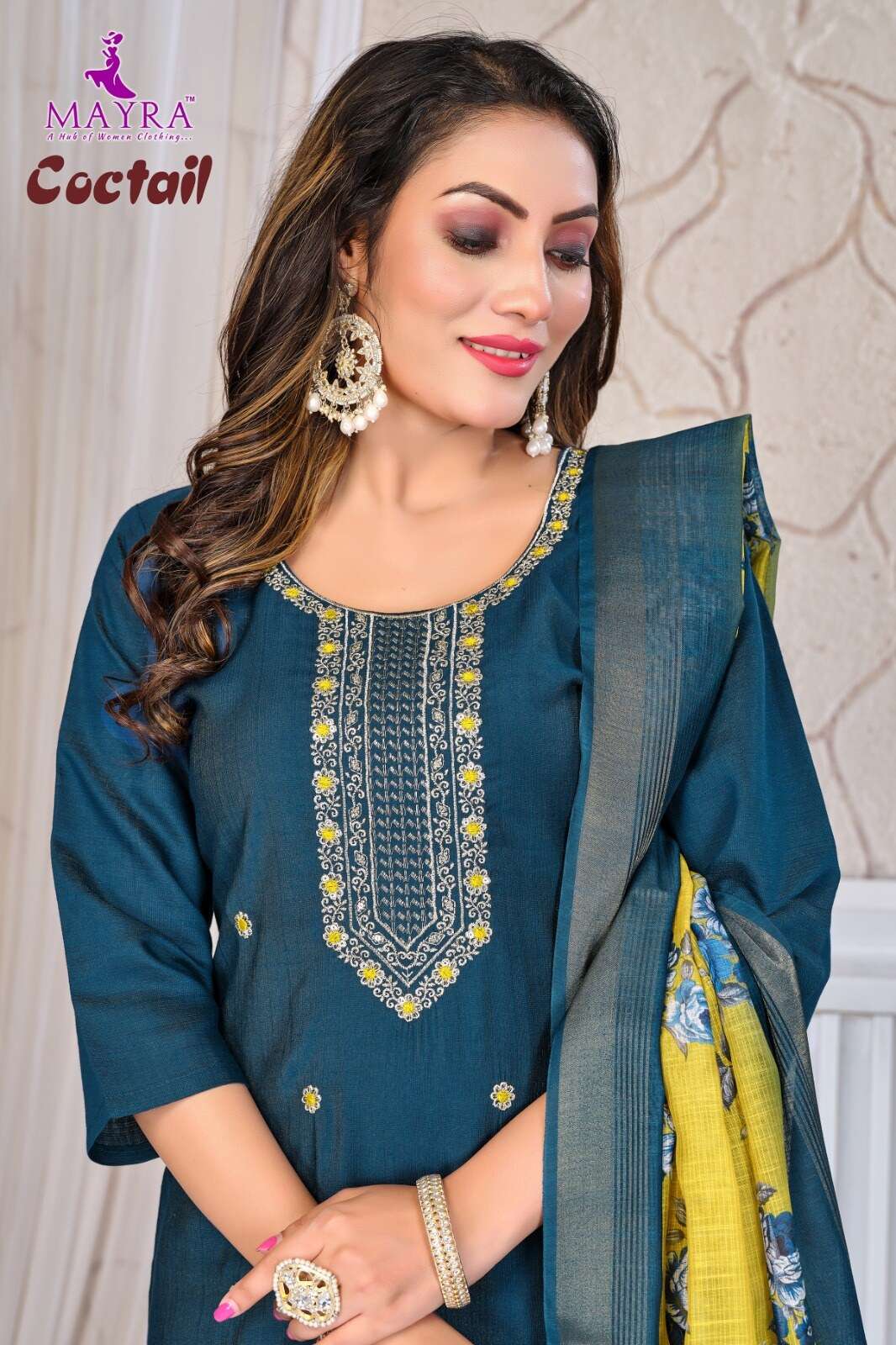 COCTAIL BY MAYRA FASHION IN VERTICAN SIMMER WITH SEQUENCE EMBROIDERY PANEL WORK