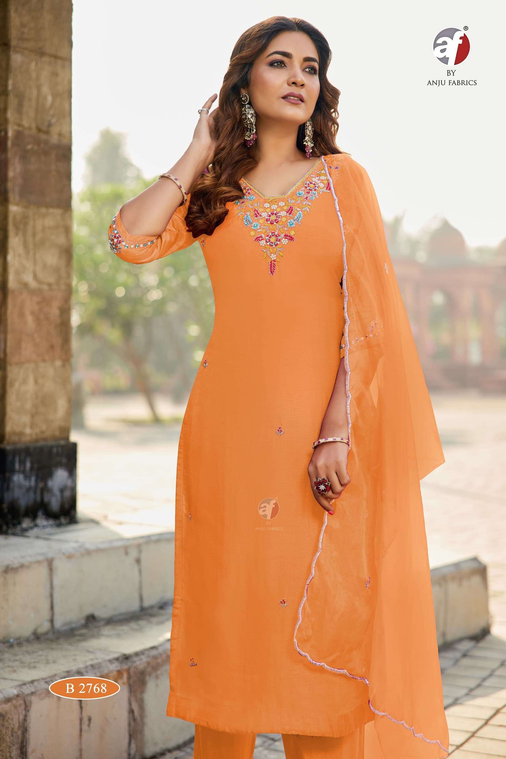 D.NO:- B 2768 BY ANJU FABRICS IN PURE DOLA SILK KURTI PANT WITH DUPATTA WITH HEAVY HANDWORK