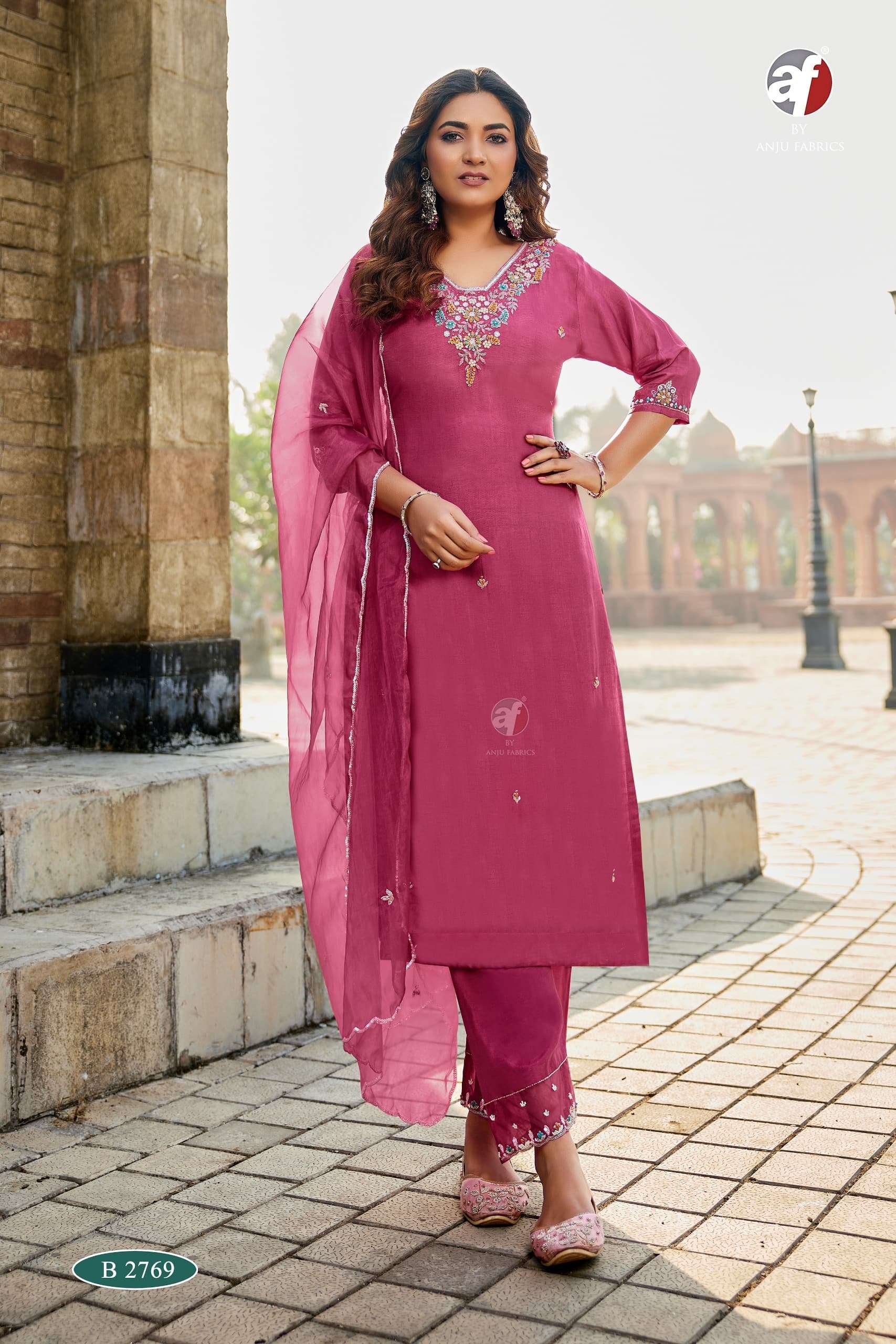 D.NO:- B 2769 BY ANJU FABRICS IN PURE DOLA SILK KURTI PANT WITH DUPATTA WITH HEAVY HANDWORK