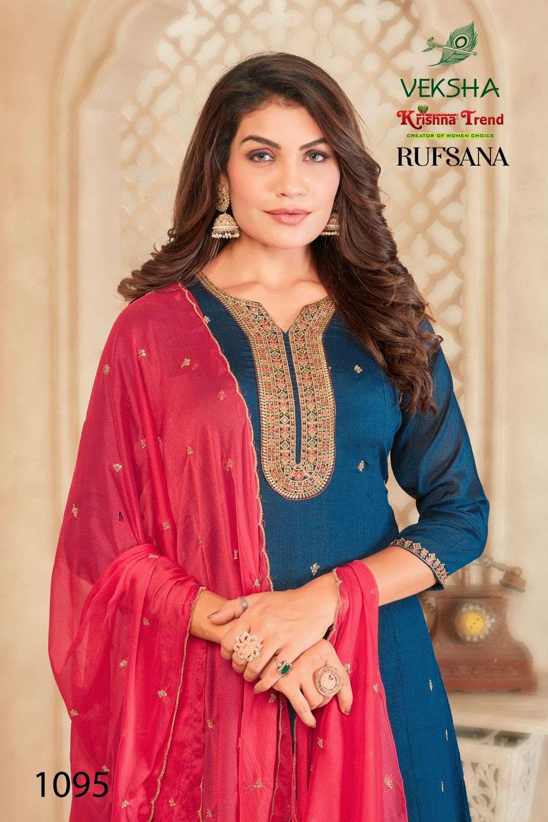 RUFSANA BY VEKSHA IN CHINNON DIED WITH INNER AND HEAVY EMBROIDERY WORK 