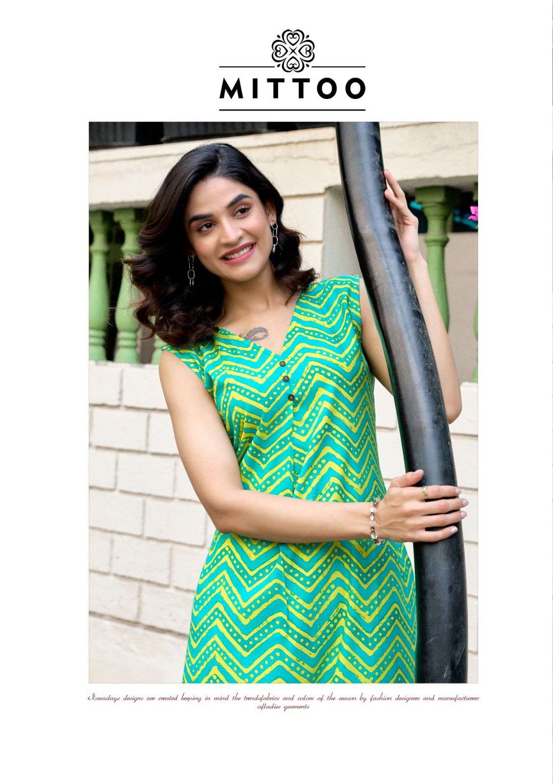 SAFFRON BY MITTOO IN RAYON PRINT WITH SLEVEE ATTACHED WITH BEAUTYFULL PRINT 