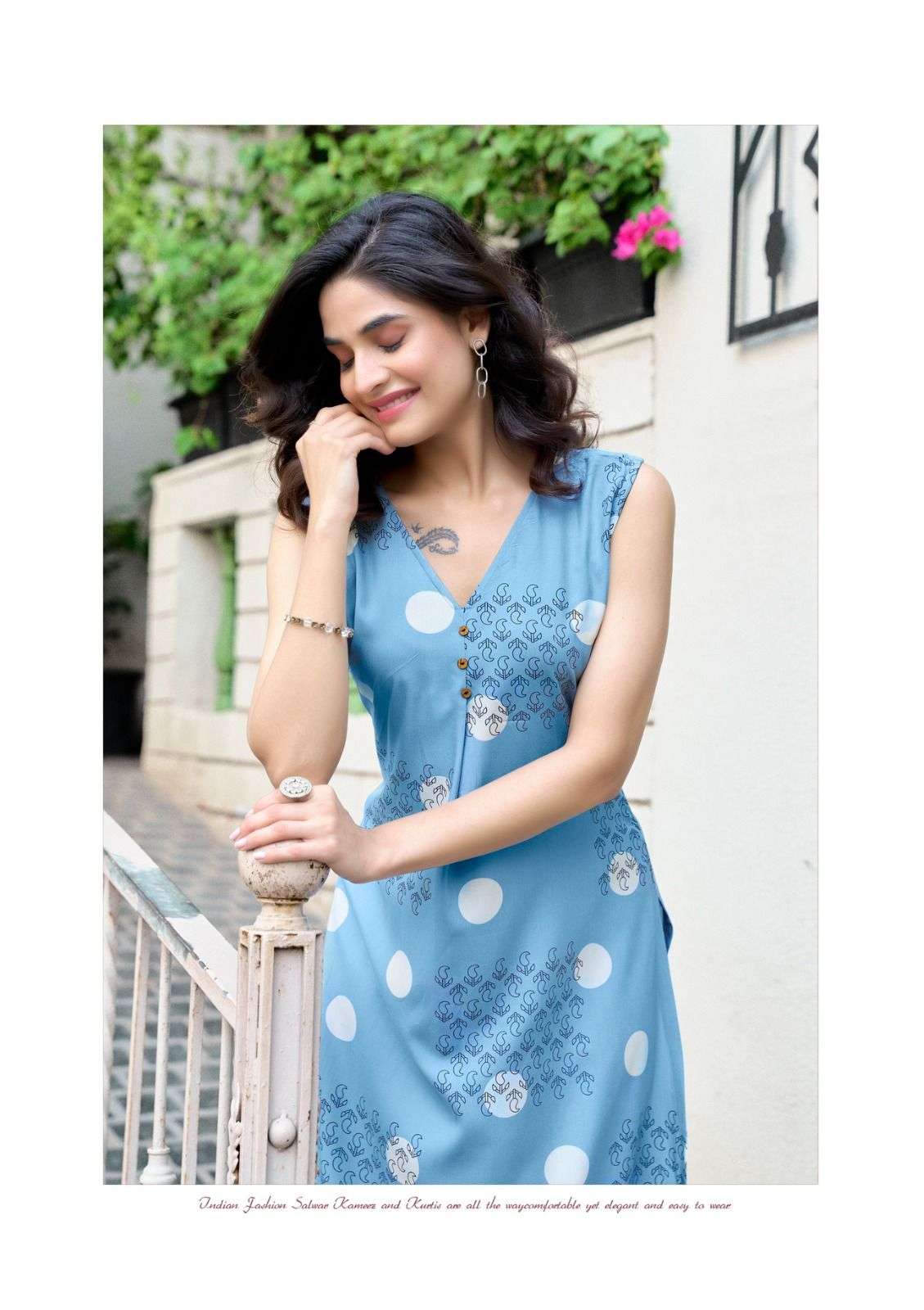 SAFFRON BY MITTOO IN RAYON PRINT WITH SLEVEE ATTACHED WITH BEAUTYFULL PRINT 