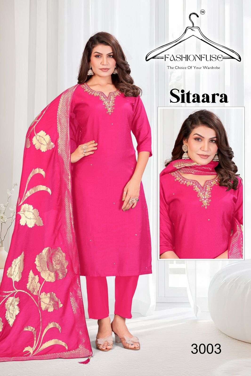 SITAARA BY FASHION FUSE IN VATICAN SILK WITH A STUNNING V-NECK AND HANDWORK WORK 