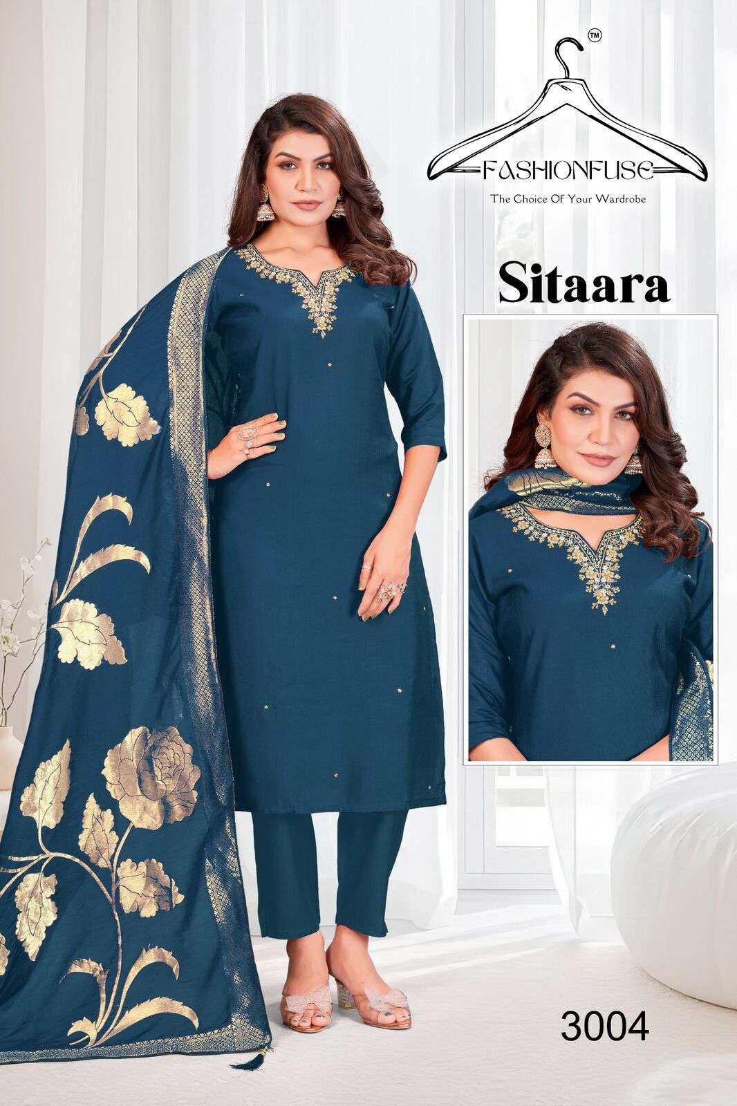 SITAARA BY FASHION FUSE IN VATICAN SILK WITH A STUNNING V-NECK AND HANDWORK WORK 