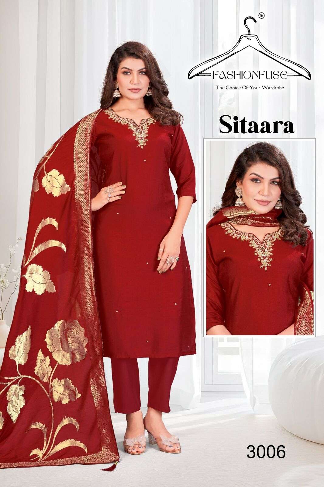 SITAARA BY FASHION FUSE IN VATICAN SILK WITH A STUNNING V-NECK AND HANDWORK WORK 