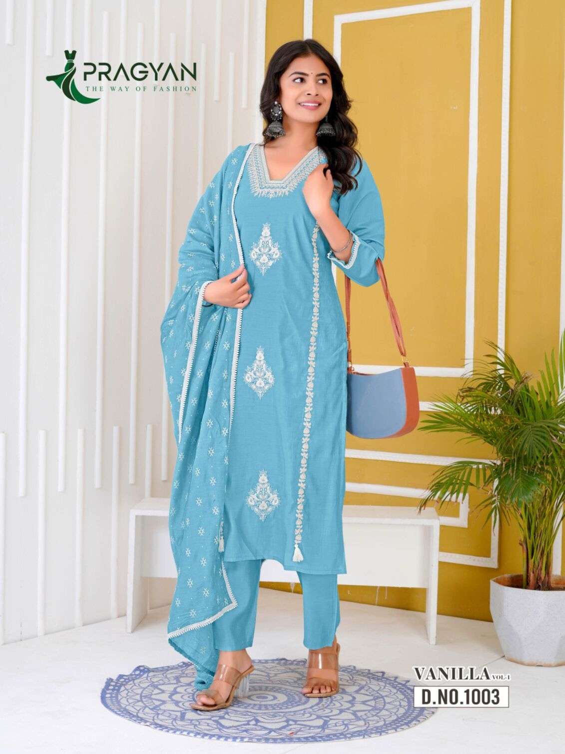 VANILLA VOL-1 BY PRAGYAN IN HEAVY ROMAN SILK WITH FANCY EMBROIDERY WORK AND CHANDERI DUPATTA