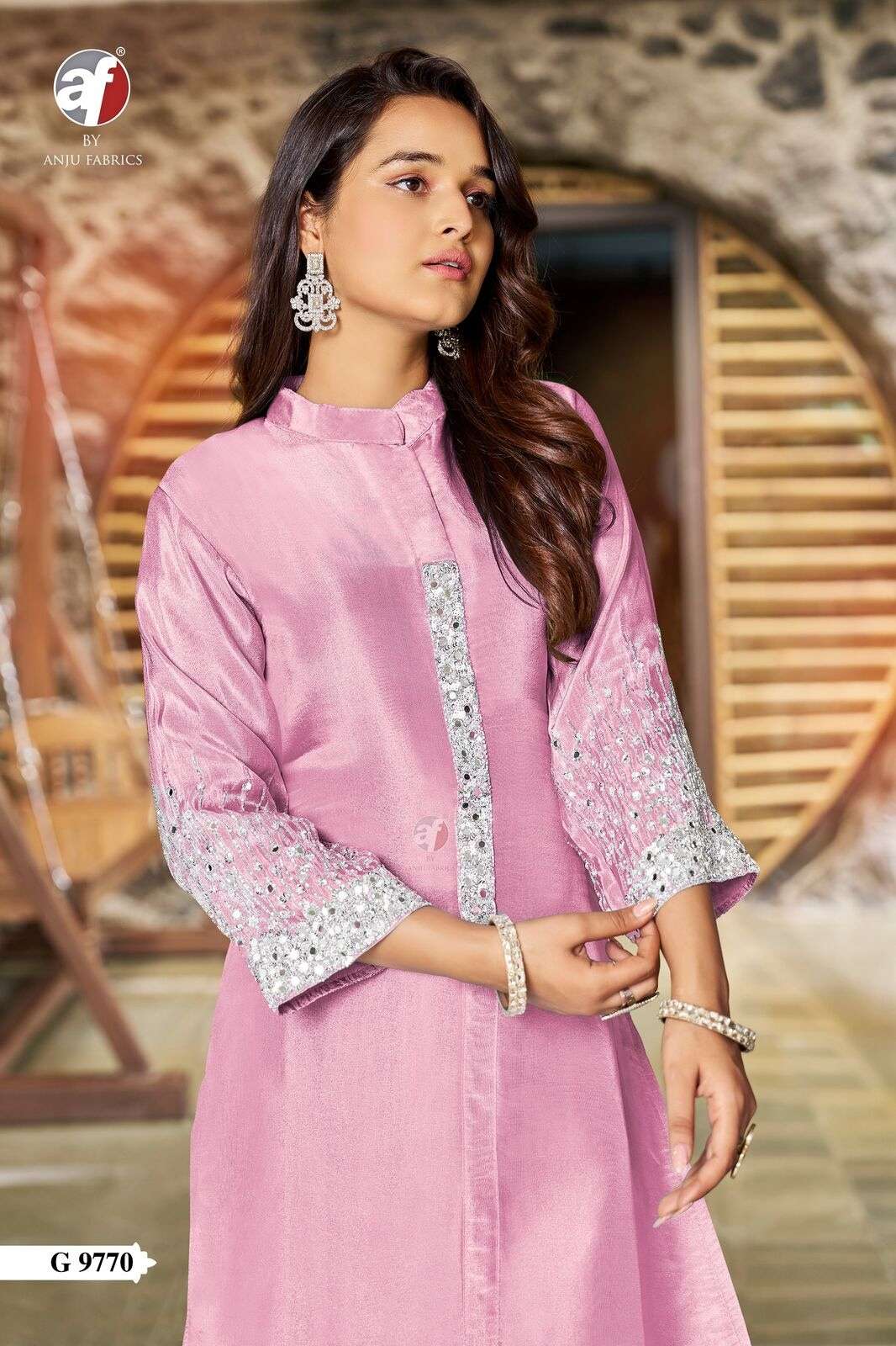 D.NO :- 9770 BY ANJU FABRICS IN PURE TISSUE SHIMMER WITH DESIGNER KURTI AND PALAZZO