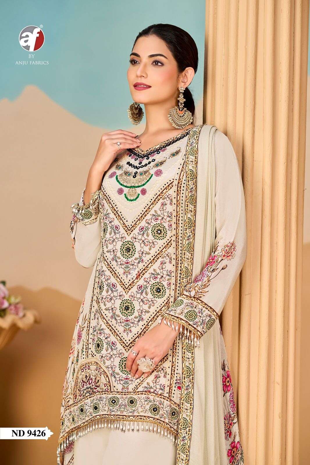 D.NO:- ND 9426 BY ANJU FABRICS IN PURE NATURAL CREPE TALE CUT KURTI WITH WIDE PANT