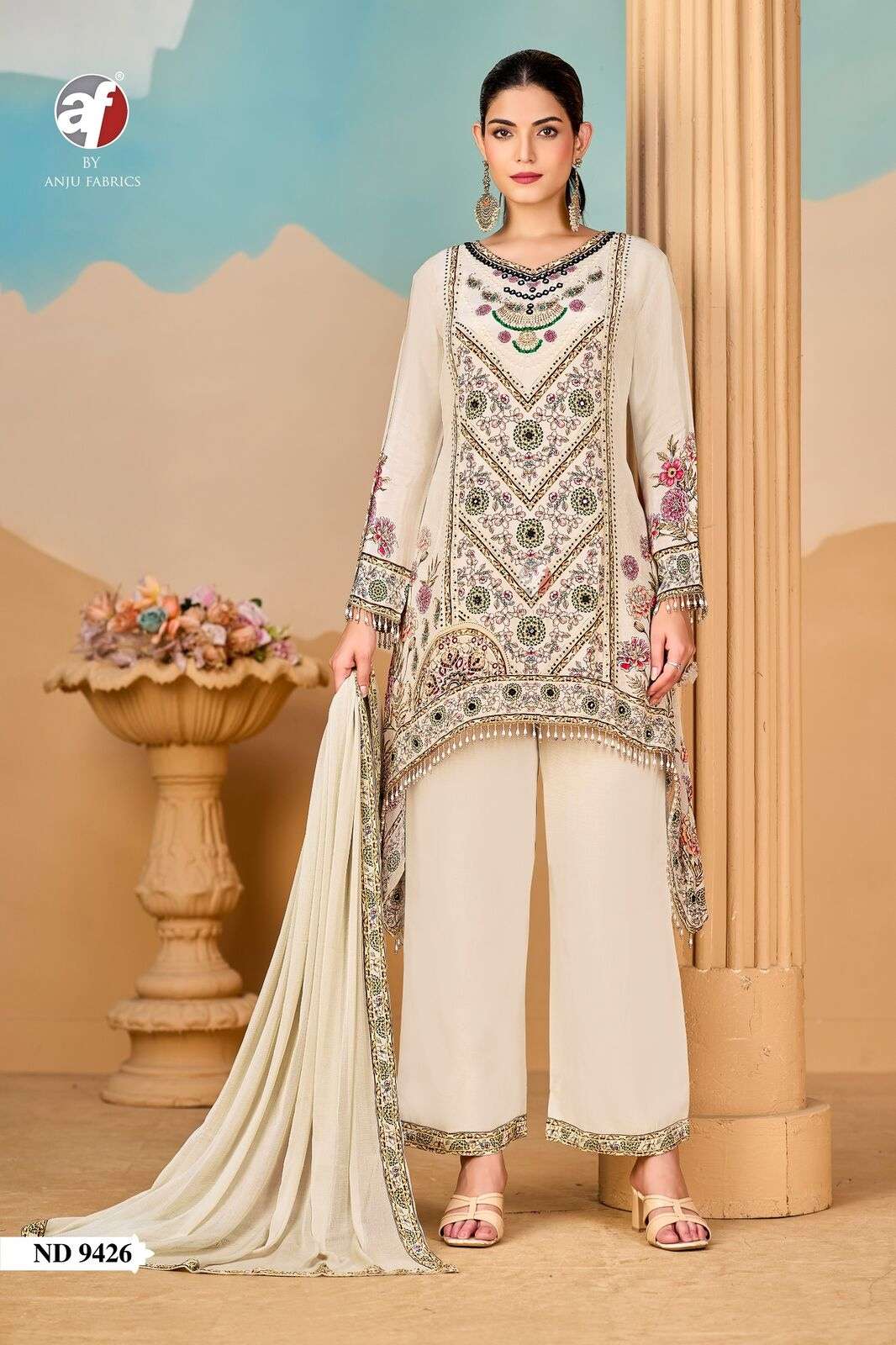 D.NO:- ND 9426 BY ANJU FABRICS IN PURE NATURAL CREPE TALE CUT KURTI WITH WIDE PANT