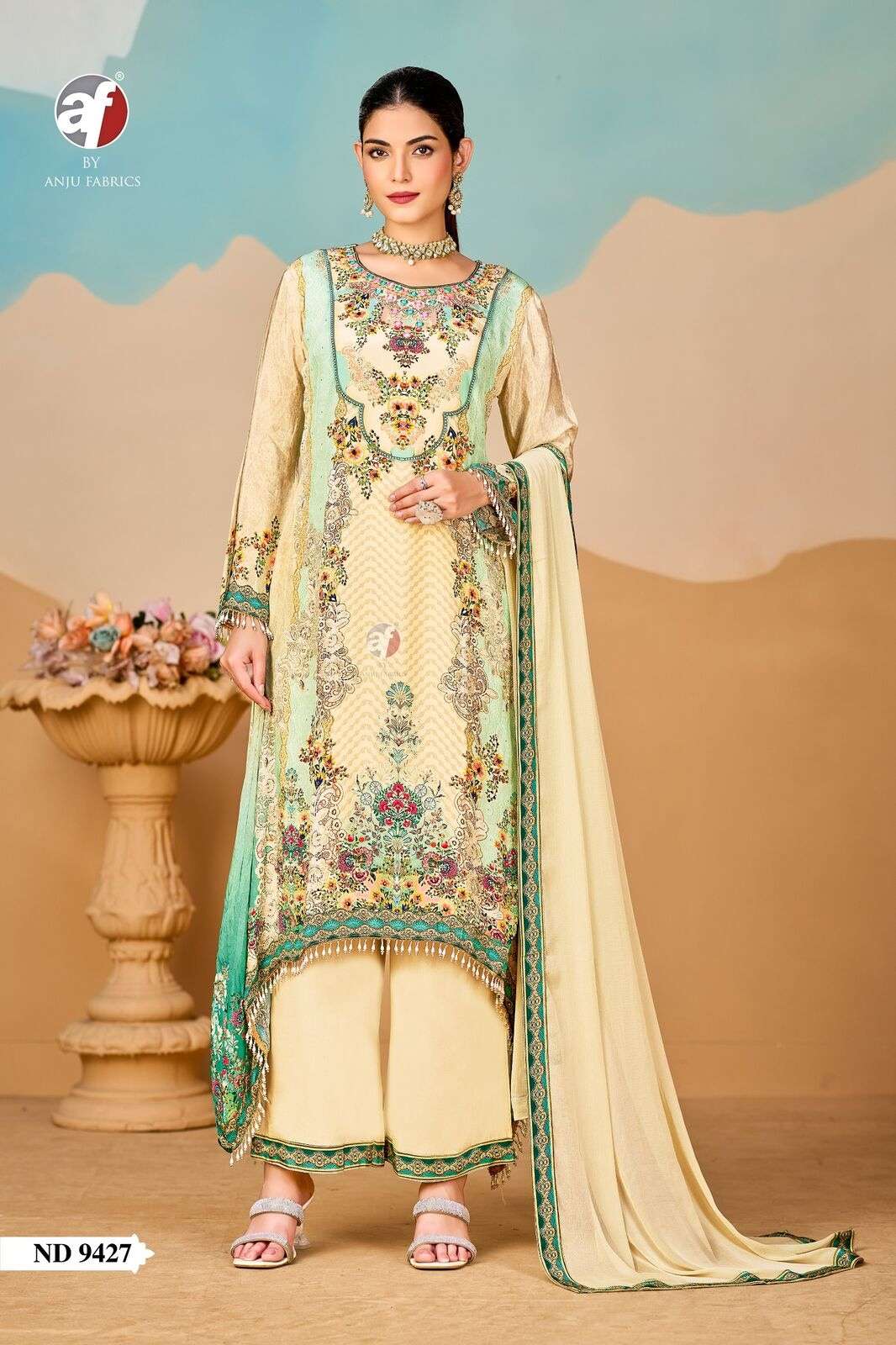 D.NO:- ND 9427 BY ANJU FABRICS IN PURE NATURAL CREPE TALE CUT KURTI WITH WIDE PANT