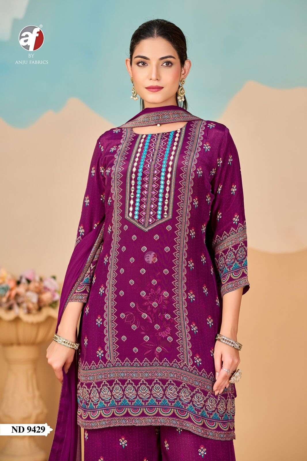 D.NO:- ND 9429 BY ANJU FABRICS IN PURE NATURAL CREPE TALE CUT KURTI WITH WIDE PANT