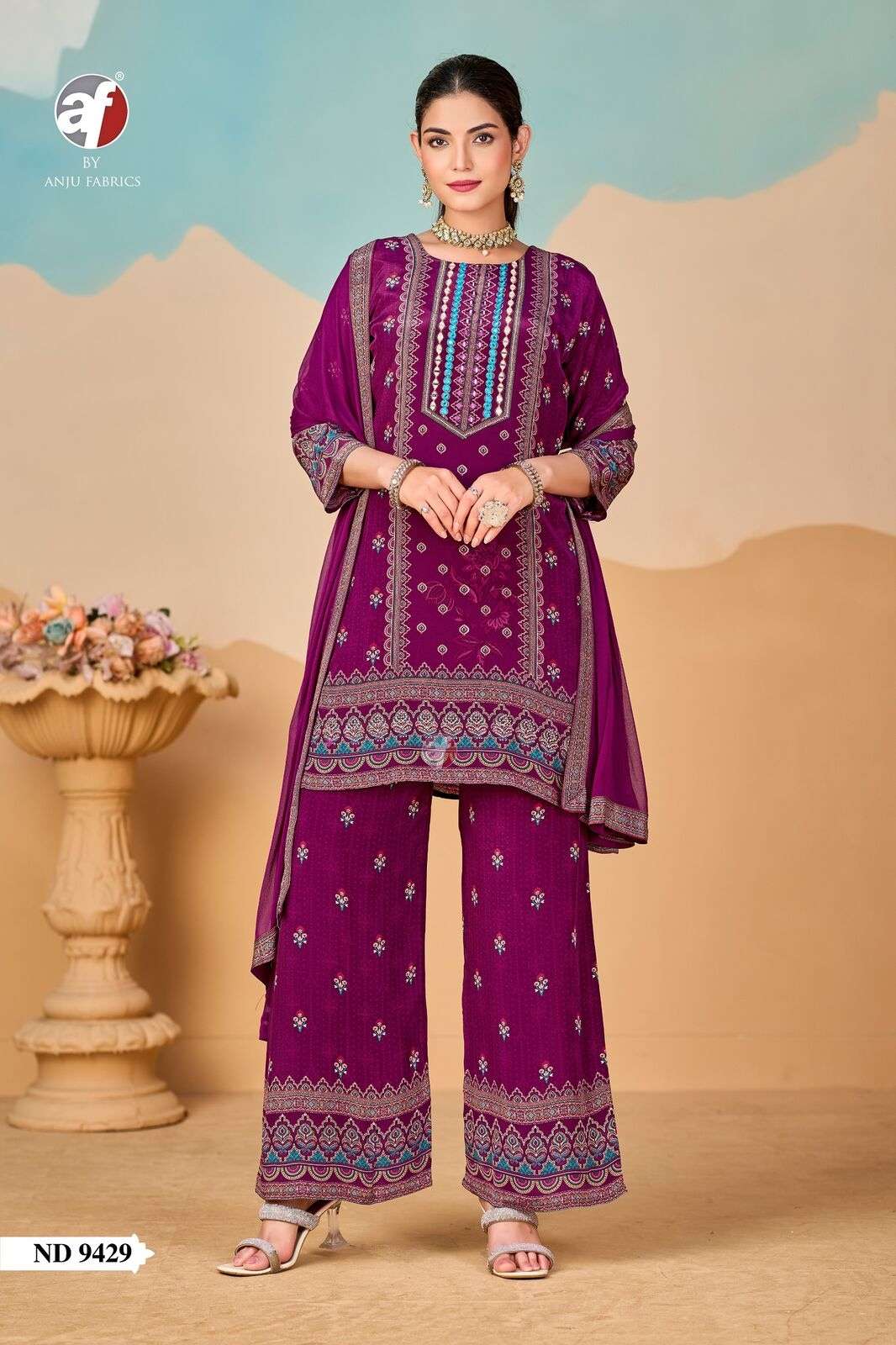 D.NO:- ND 9429 BY ANJU FABRICS IN PURE NATURAL CREPE TALE CUT KURTI WITH WIDE PANT