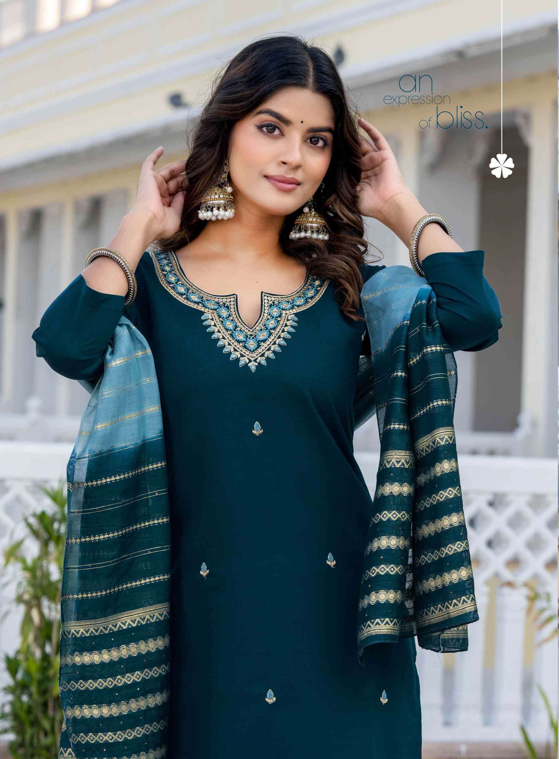 HEENA VOL-2 BY ERRAHA IN PREMIUM VATICAN FABRICS WITH UNIQUE EMBROIDERY IN NECK & ALL OVER BUTTA 
