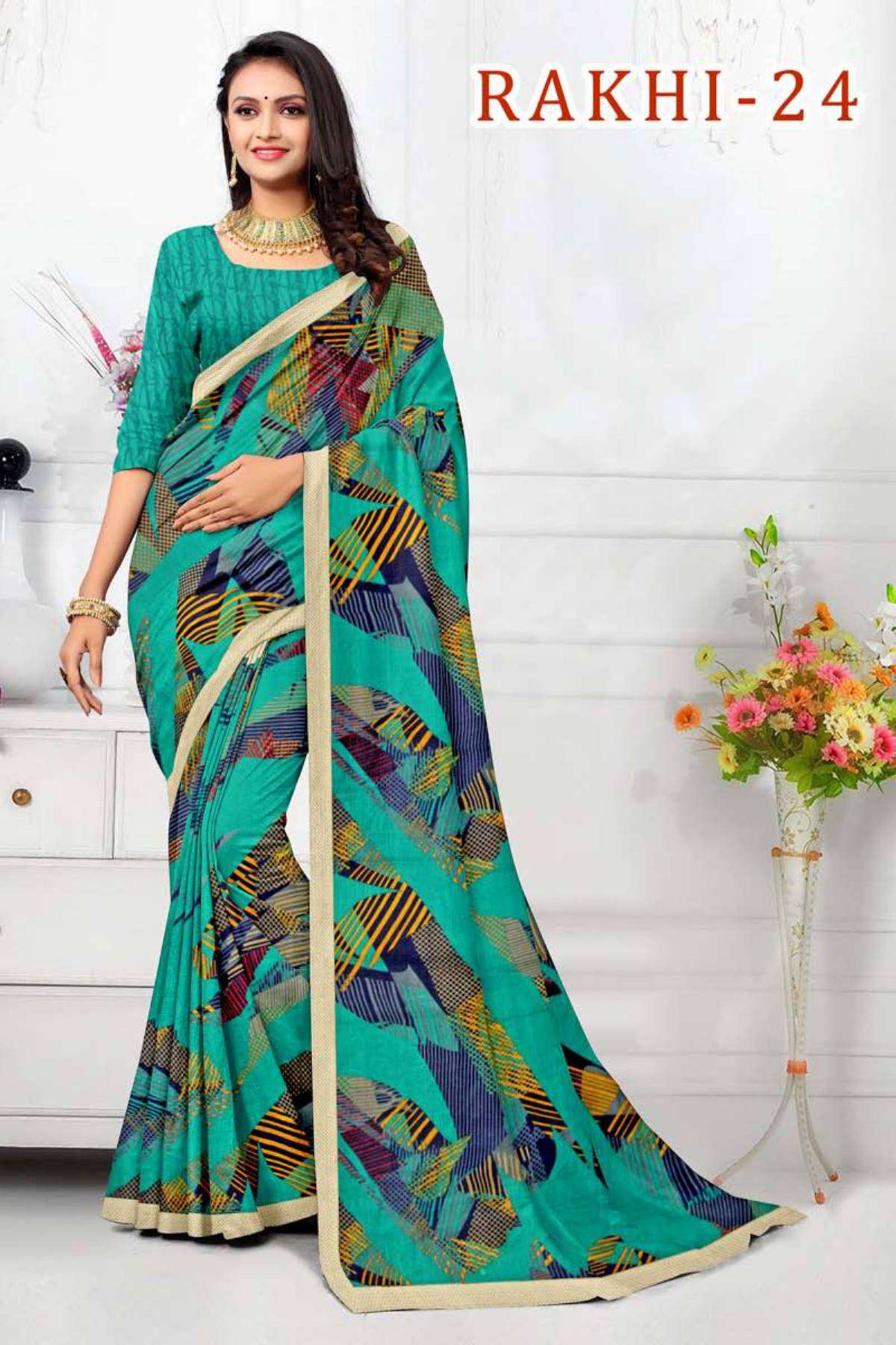 RAKHI-24 BY TEXOFAB IN RANIAL GEORGETTE ALL OVER PRINTED SAREE WITH BORDER 