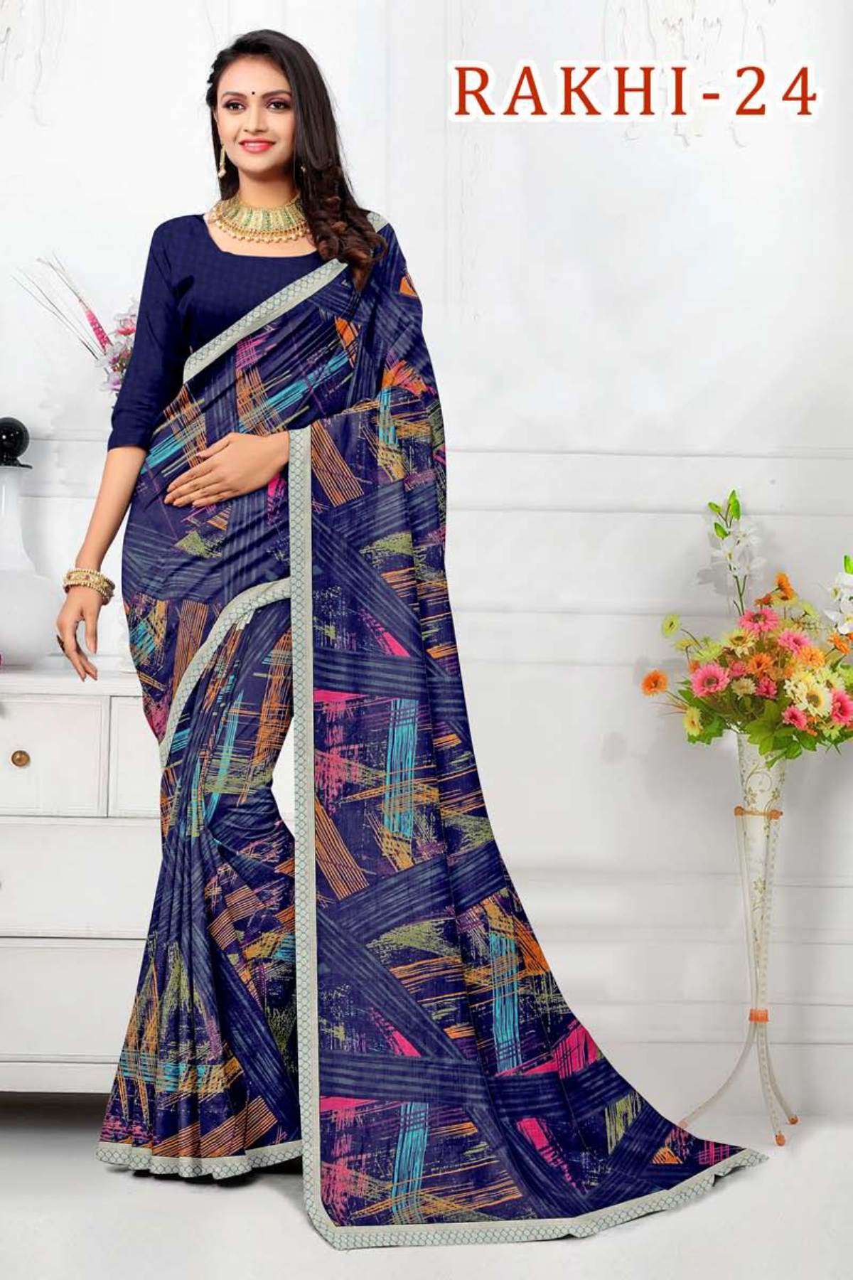 RAKHI-24 BY TEXOFAB IN RANIAL GEORGETTE ALL OVER PRINTED SAREE WITH BORDER 