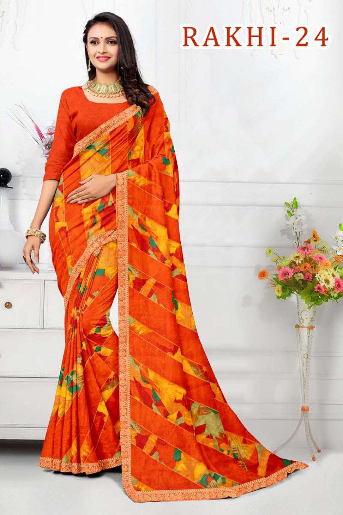 RAKHI-24 BY TEXOFAB IN RANIAL GEORGETTE ALL OVER PRINTED SAREE WITH BORDER 