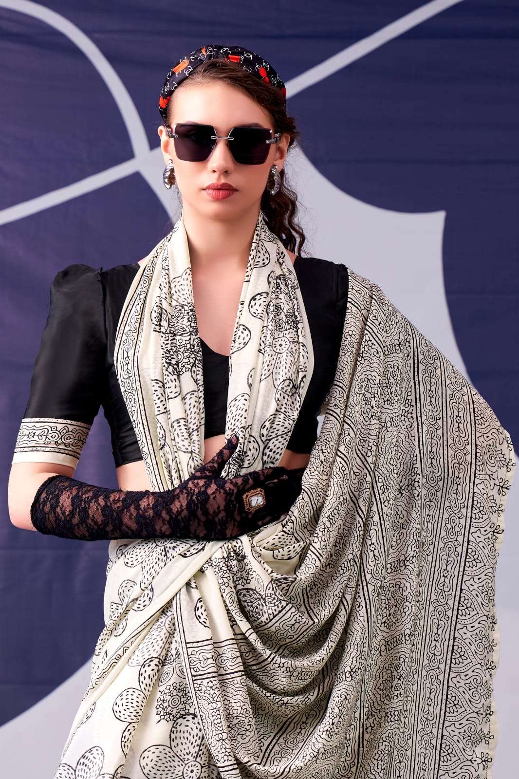 CLASSIC BEAUTY REDEFINED WITH SILKY SMOOTH TEXTURE AND ARTISTIC FLORAL DETAILLING SAREE KASHVIYA