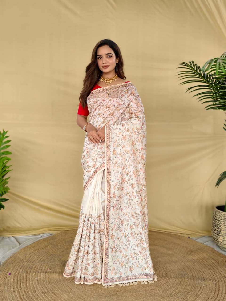 PURE LOOM TASAR SAREE WITH DESIGNER EMBROIDERY PATTERN,  HANDLOOM INSPIRED TASSELS AND GOLD ZARI BORDER.