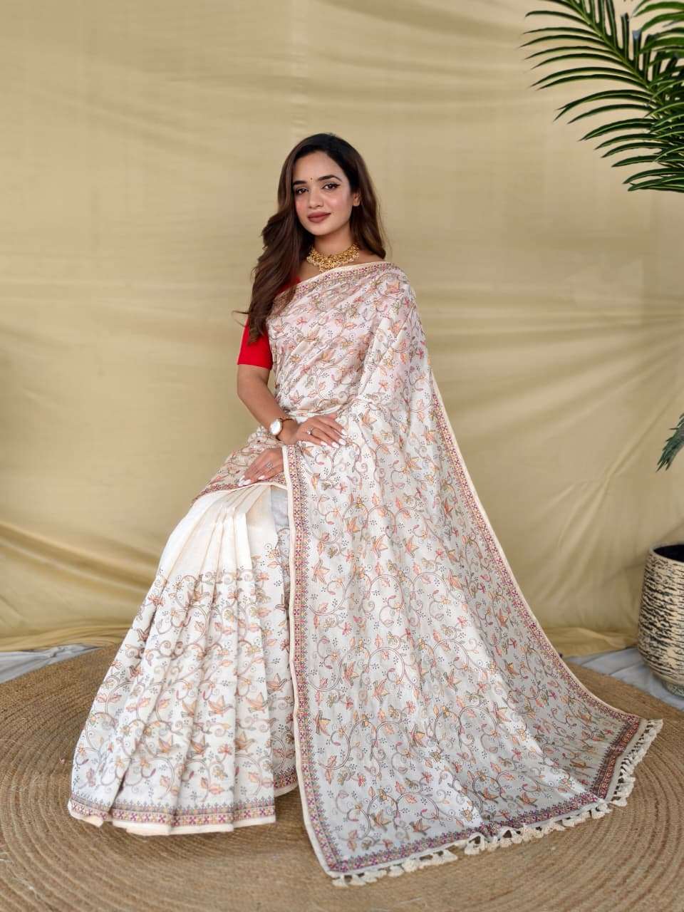 PURE LOOM TASAR SAREE WITH DESIGNER EMBROIDERY PATTERN,  HANDLOOM INSPIRED TASSELS AND GOLD ZARI BORDER.