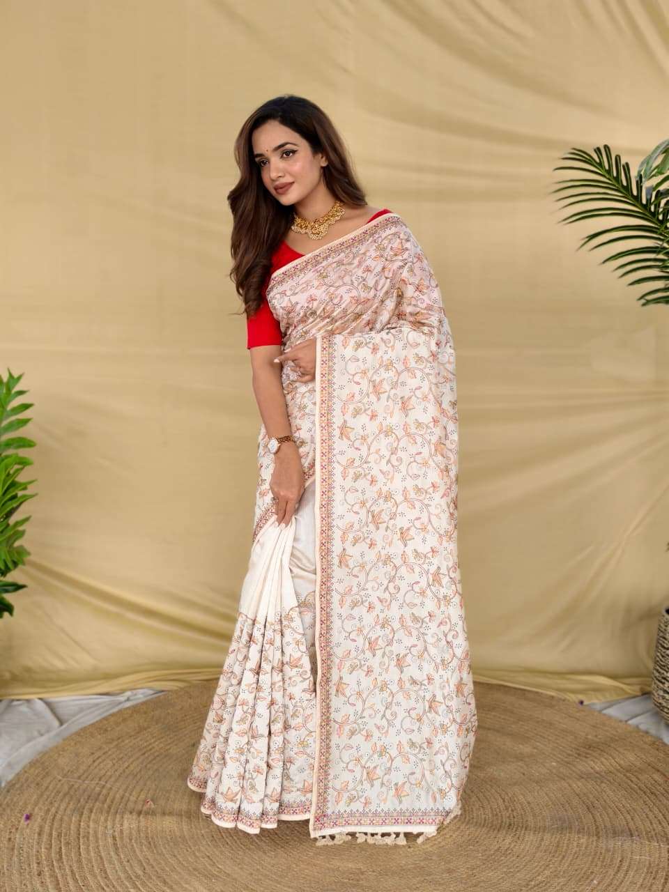 PURE LOOM TASAR SAREE WITH DESIGNER EMBROIDERY PATTERN,  HANDLOOM INSPIRED TASSELS AND GOLD ZARI BORDER.
