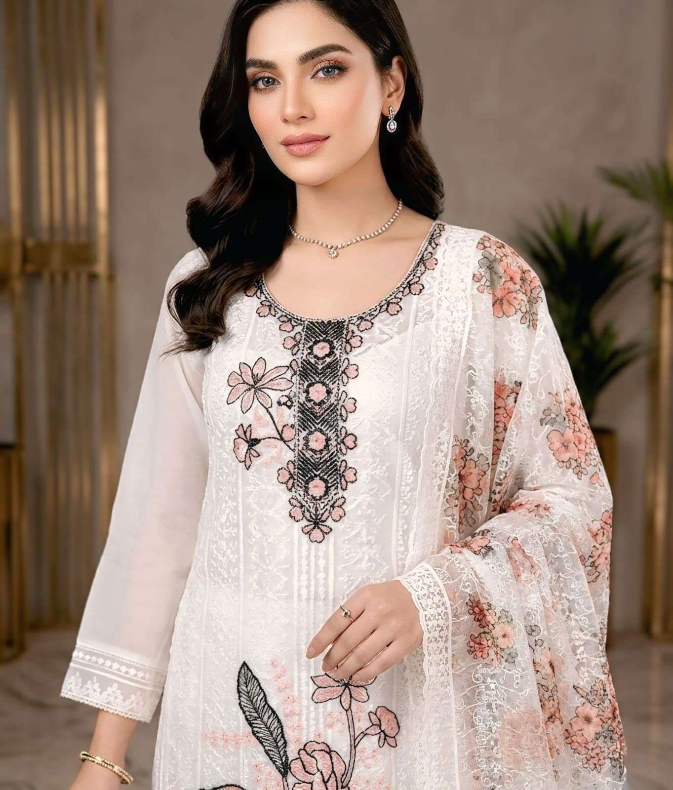  HEAVY SHIFFLI  STICH SUIT  HEAVY GEORGETTE THOUSAND BUTTA WITH DIGITAL PRINTS  WITH EMBROIDERY NACK WORK EXPORTER SURAT